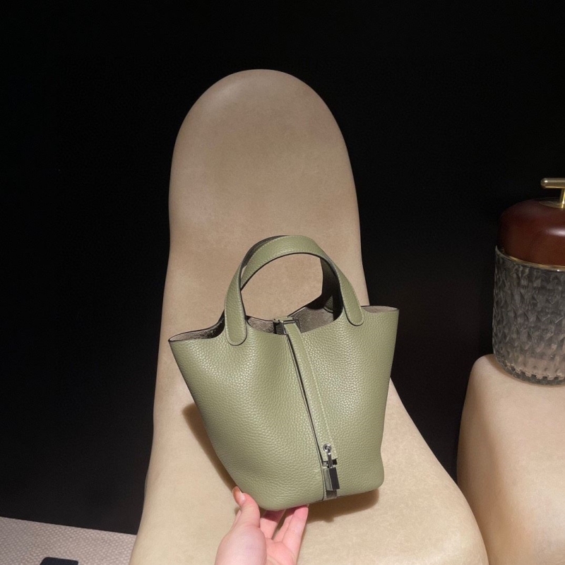 H**mes shopping bags